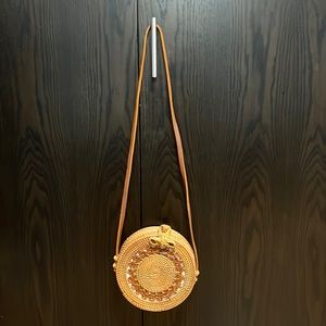 Circle woven crossbody bag